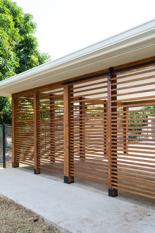 Inspiration for a large contemporary detached two-car carport remodel in Hawaii