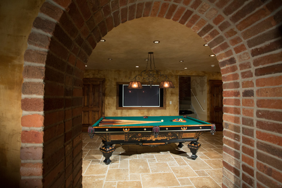 Photo of a large traditional look-out basement in Chicago with travertine floors.