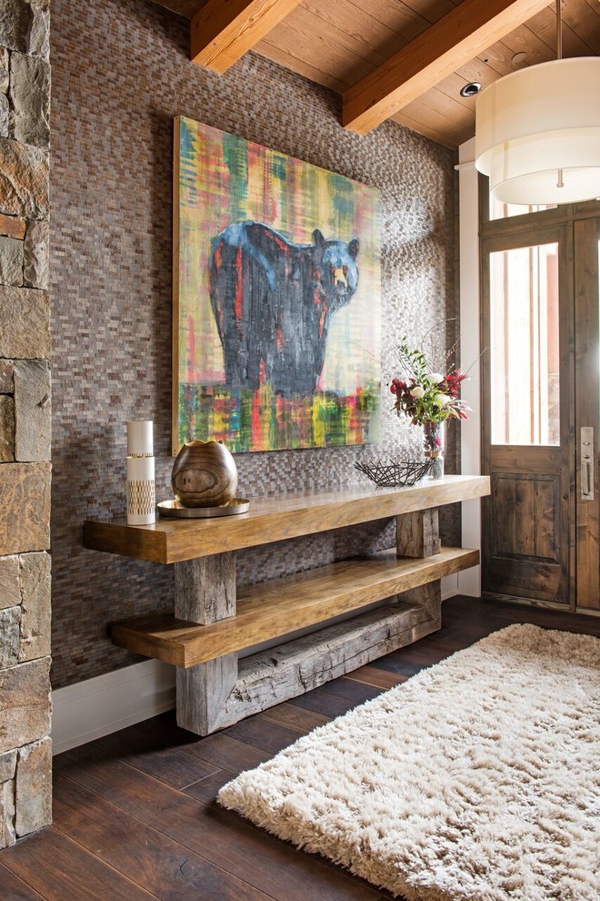 Inspiration for an entryway in Other with dark hardwood floors and brown floor.
