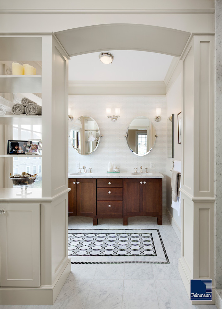 Inspiration for a traditional bathroom in Boston with an undermount sink, dark wood cabinets, white tile and shaker cabinets.