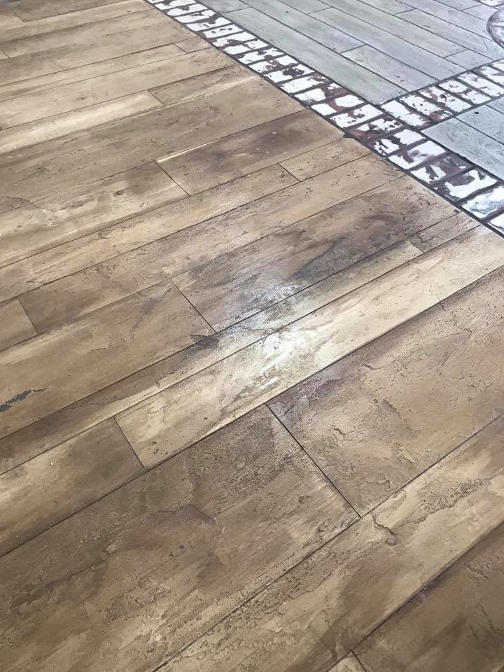 Inspiration for a mid-sized rustic medium tone wood floor entry hall remodel in Orlando