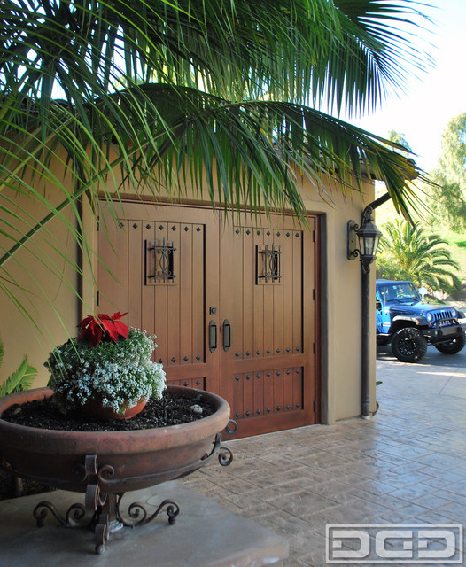 Mediterranean Carriage House Style Garage Doors That Swing