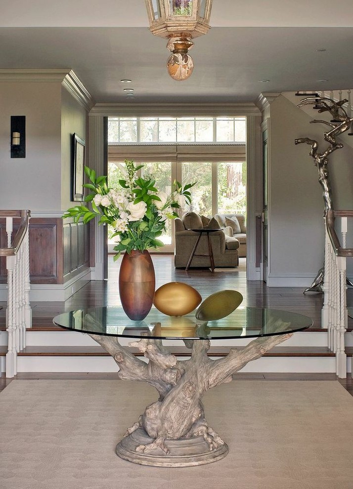 Inspiration for a large country foyer in San Francisco with beige walls, a single front door and a dark wood front door.