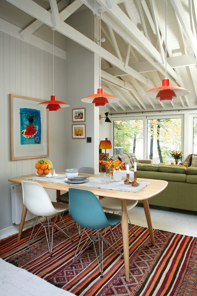 Inspiration for an eclectic open plan dining room in London with grey walls.