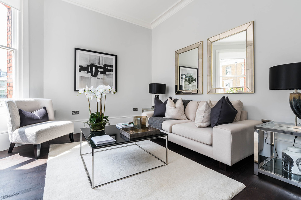 Design ideas for a classic open plan living room in London with grey walls, dark hardwood flooring, no fireplace and no tv.