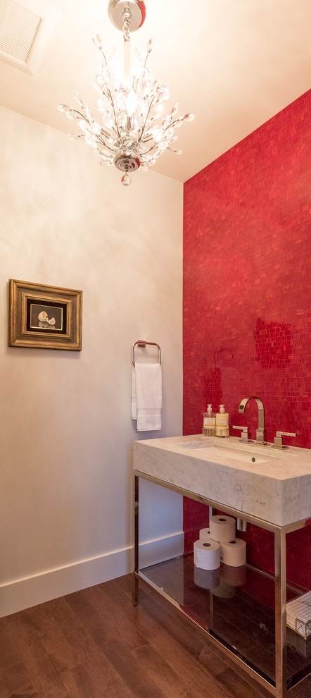 Inspiration for a mid-sized contemporary powder room in Denver with red tile, mosaic tile, grey walls, medium hardwood floors, an undermount sink, marble benchtops, brown floor and white benchtops.