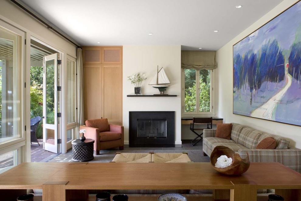 This is an example of a contemporary living room in San Francisco with slate floors.
