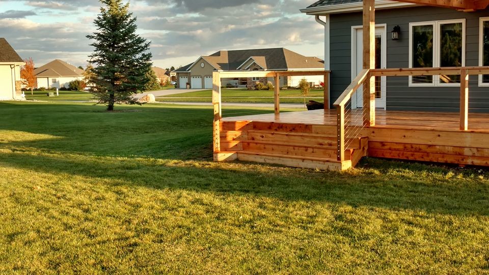 Inspiration for a large rustic deck remodel with a pergola