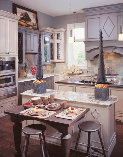 Kitchen - mid-sized transitional dark wood floor kitchen idea in Indianapolis with granite countertops, stainless steel appliances and two islands