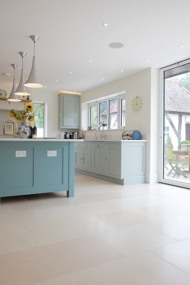 Design ideas for a contemporary kitchen in Wiltshire with limestone floors.