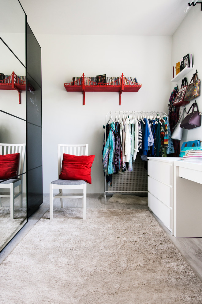 Contemporary women's storage and wardrobe in Moscow with flat-panel cabinets, carpet and beige floor.