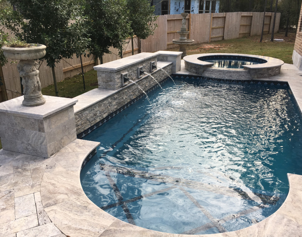 Small transitional backyard tile and rectangular lap hot tub photo in Houston