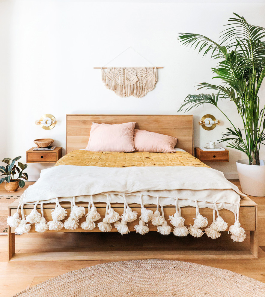 Large danish master light wood floor and beige floor bedroom photo in San Francisco with white walls and no fireplace