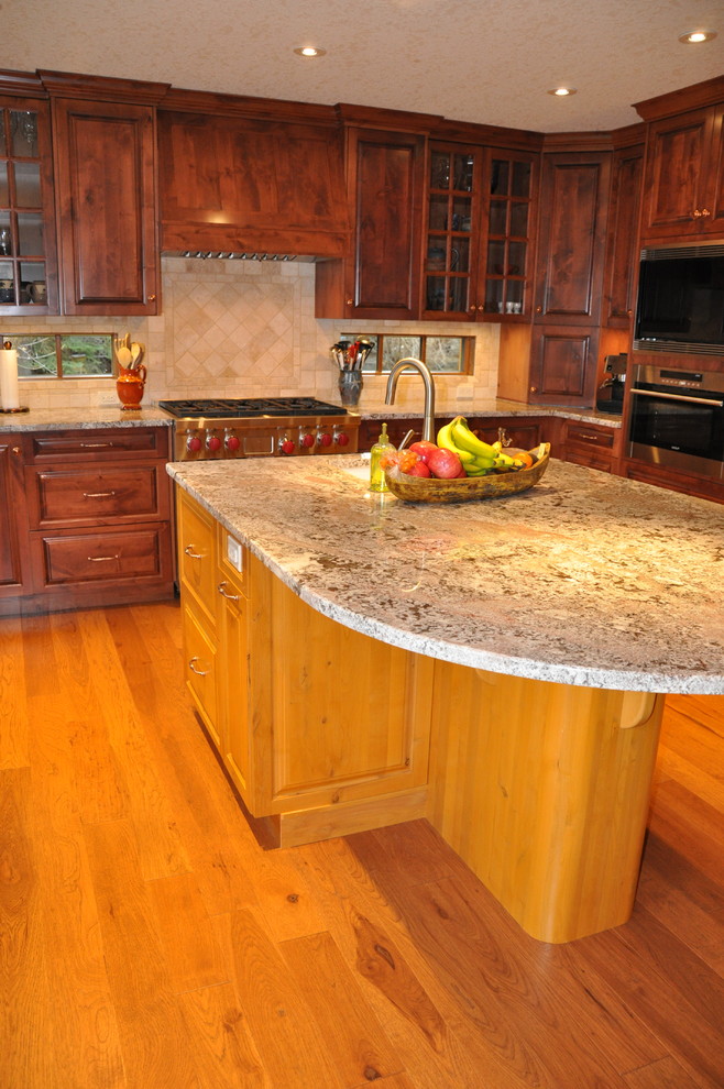 Example of a mountain style kitchen design in Calgary