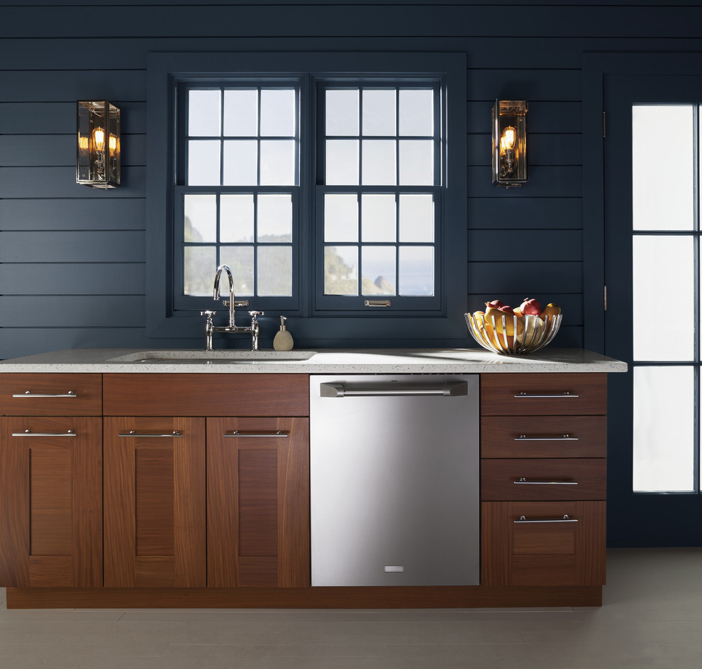 Inspiration for a mid-sized transitional single-wall beige floor enclosed kitchen remodel in Miami with an undermount sink, shaker cabinets, medium tone wood cabinets, quartz countertops, stainless steel appliances and no island