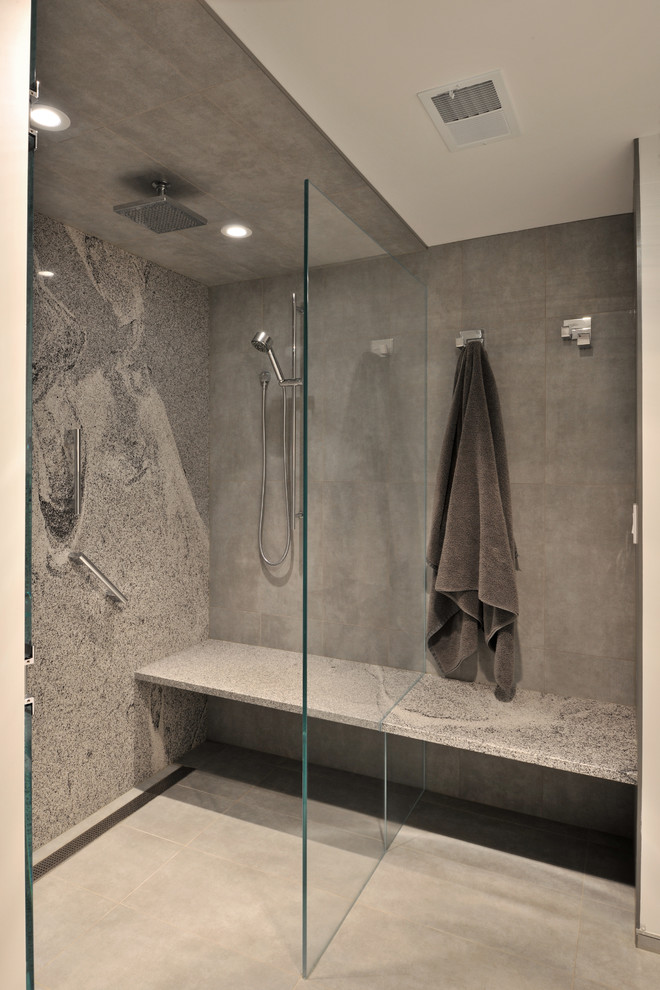 Mid-sized contemporary master bathroom in Other with an open shower, gray tile, white walls, a vessel sink, porcelain tile, porcelain floors and an open shower.