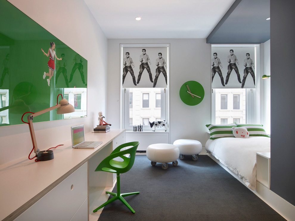 Photo of a mid-sized contemporary gender-neutral kids' room in New York with white walls and carpet.