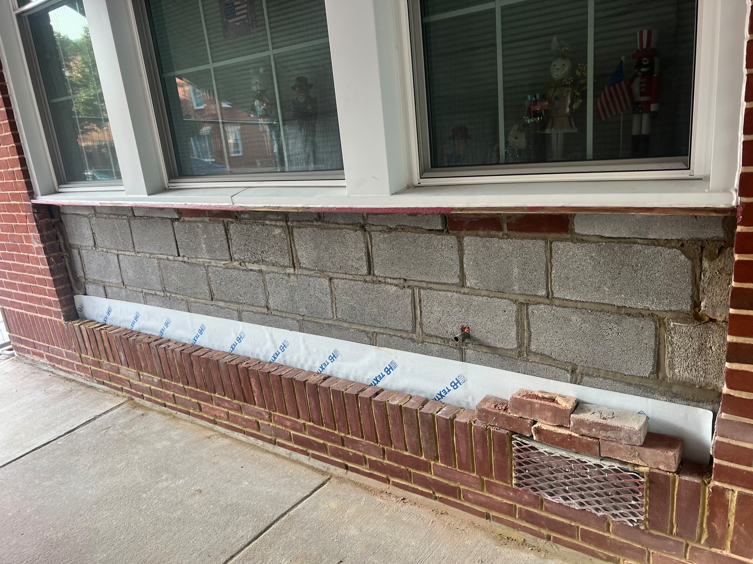 Historic wall panel and brick veneer replacement
