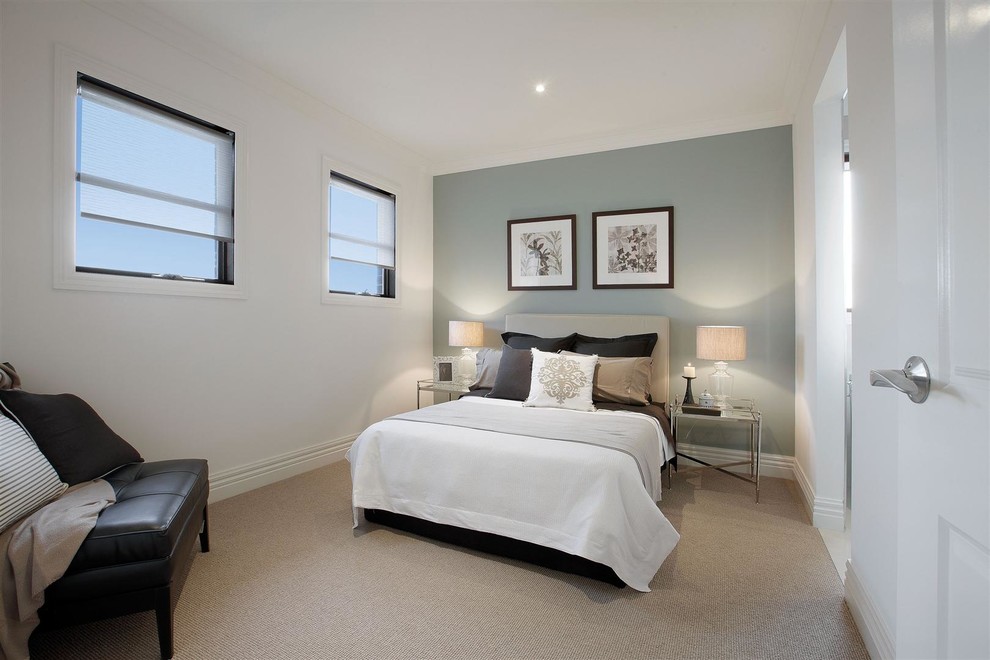 Photo of a mid-sized traditional guest bedroom in Melbourne with blue walls, carpet and no fireplace.