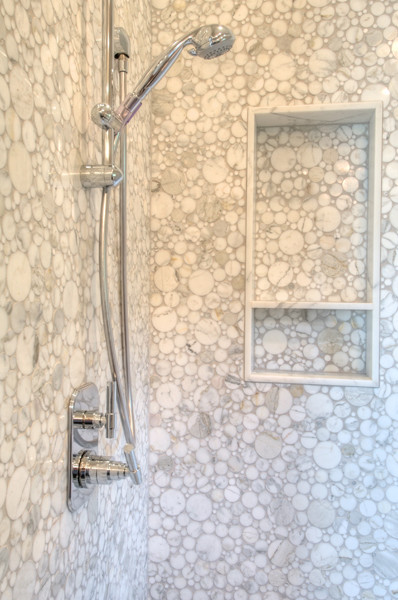 Inspiration for a modern multicolored tile and mosaic tile corner shower remodel