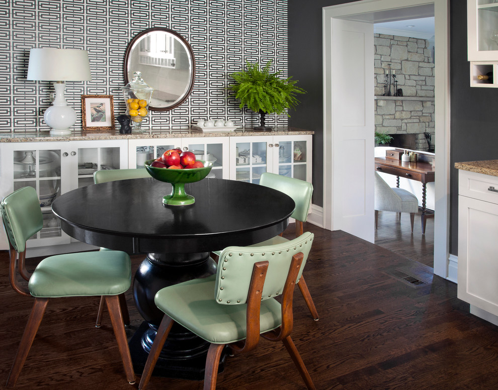 Transitional separate dining room in Chicago with grey walls and dark hardwood floors.