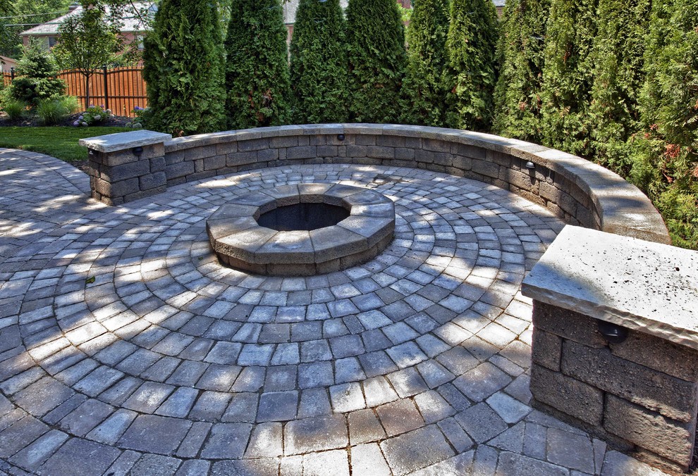 Inspiration for a traditional patio in St Louis with a fire feature.