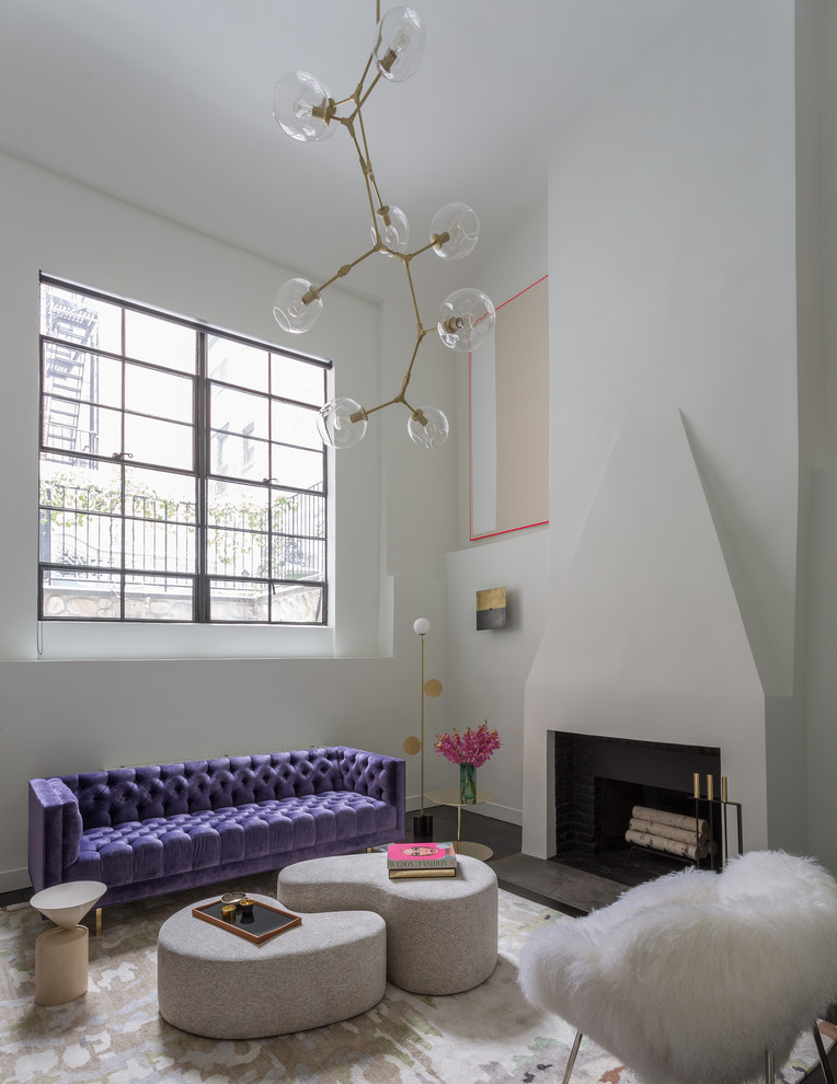 West Village Pied-A-Terre - Notable decor elements include: Manzanares ottomans,
Las Venus Modern tufted sofa,
Areti Plates floor lamp from Camerich,
Apparatus Buddy sconces,
The Rug Company Tidal rug,
Future Perfect Laurel side table,
Pilgrim Art fireplace tools from A la Mod Inc,
Cappellini Gong side table,
Photography: Francesco Bertocci