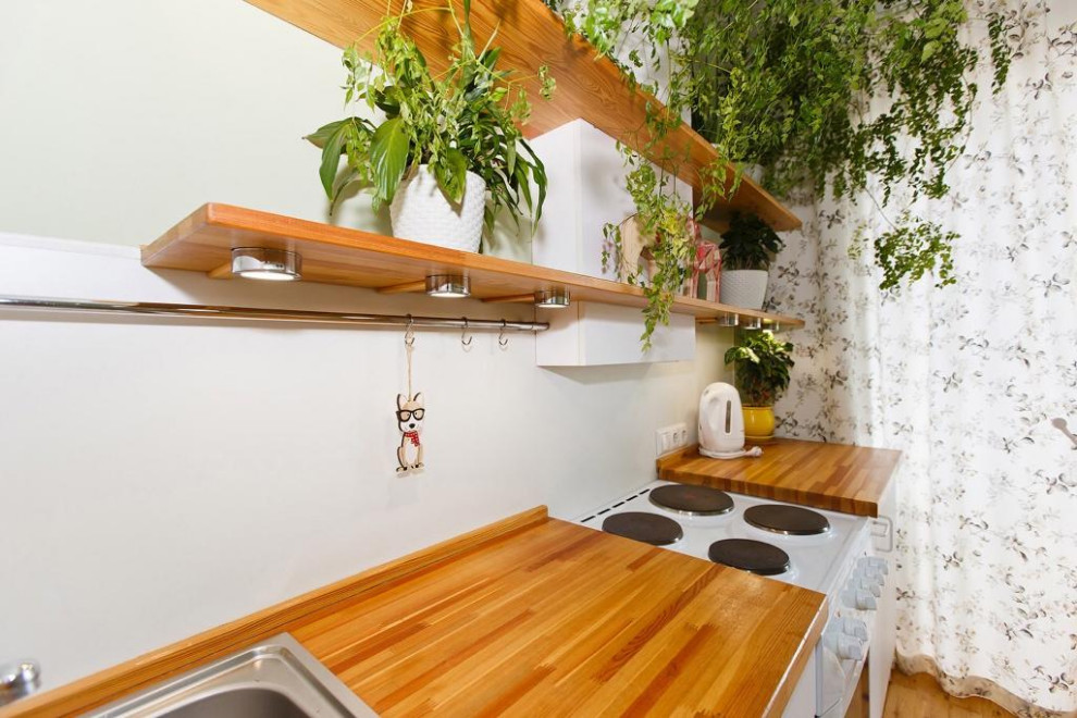Idéer för att renovera ett mellanstort minimalistiskt l-kök