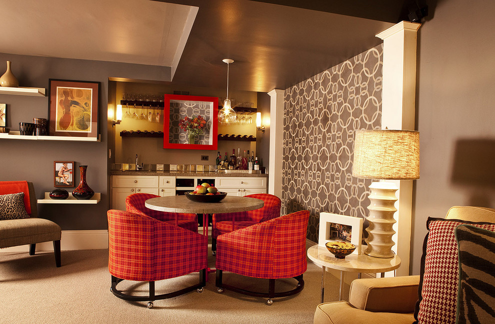 This is an example of a transitional basement in Portland with brown walls, carpet, no fireplace and a home bar.