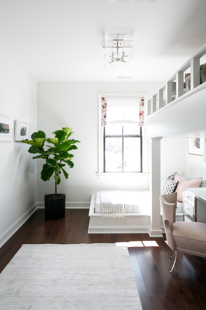 Mistflower - Example of a mid-sized transitional guest medium tone wood floor and brown floor kids' room design in Louisville with white walls