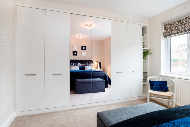 A Monochrome Bedroom With Fitted Furniture Scandinavian