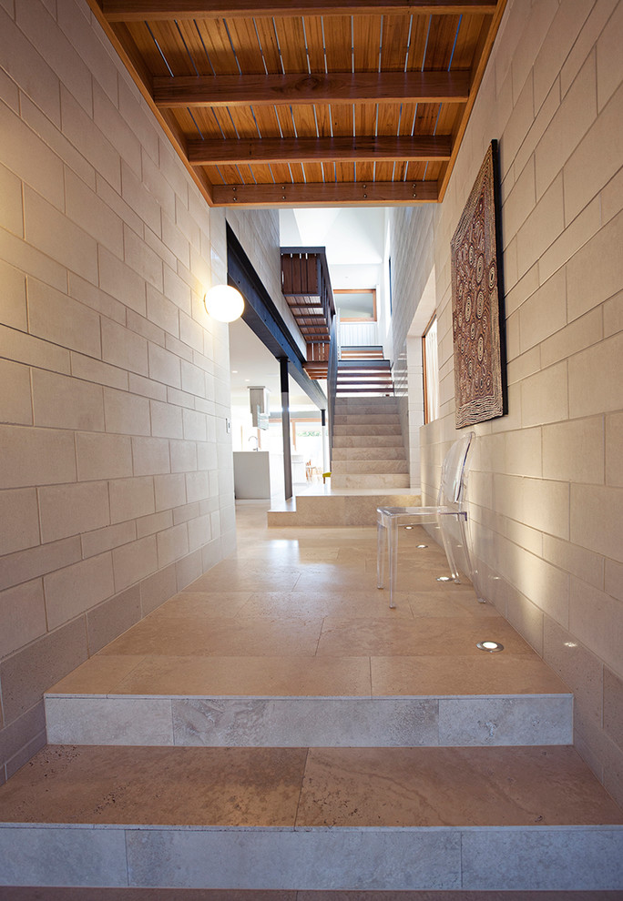 Photo of a contemporary hallway in Brisbane with beige walls.