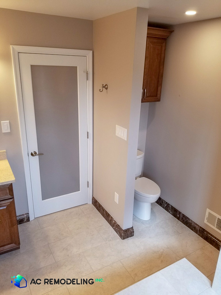 Private toilet area and frosted glass door.