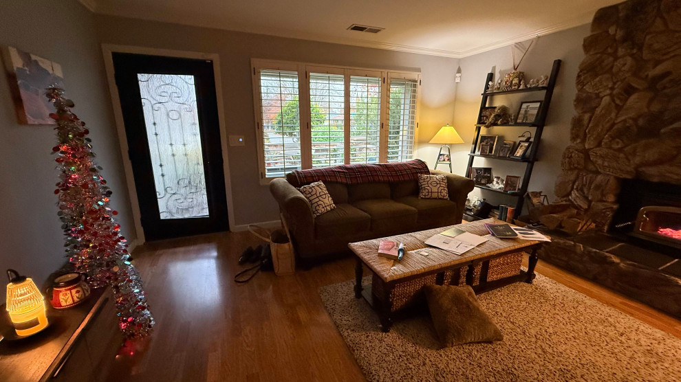 BEFORE: DARK, CLUTTERED LIVING ROOM