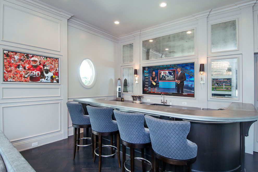 Wet bar - traditional u-shaped dark wood floor and brown floor wet bar idea in Tampa with gray countertops