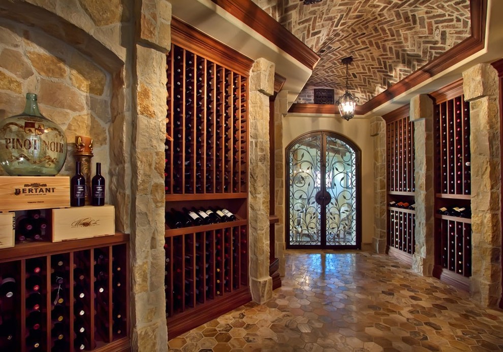 Design ideas for a traditional wine cellar in San Diego with storage racks.