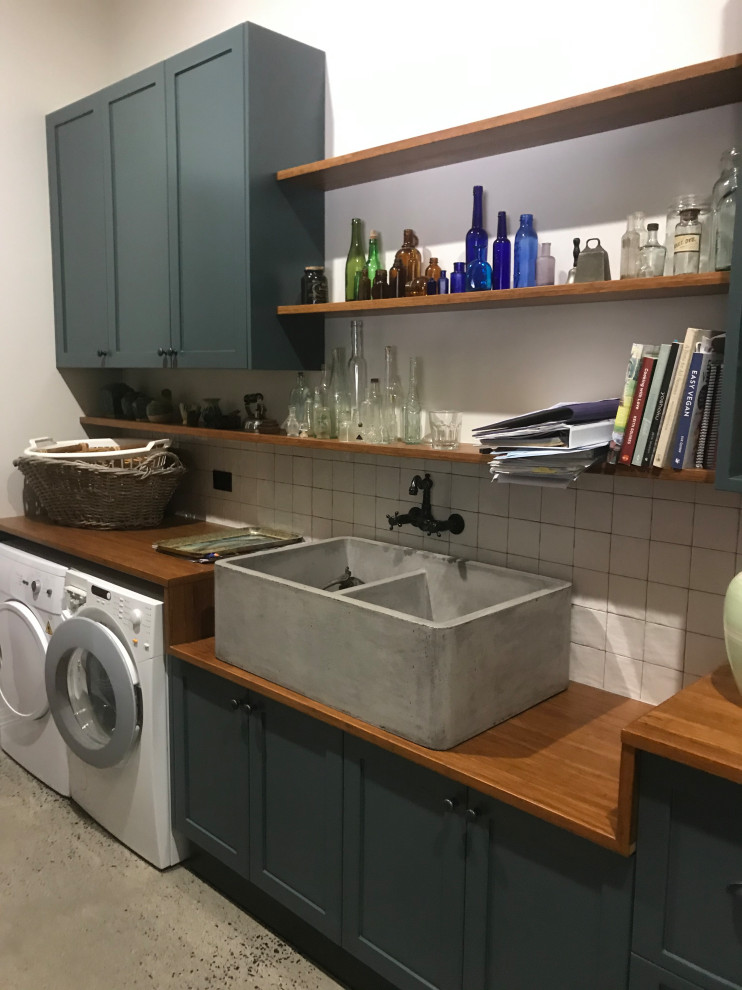 Design ideas for a contemporary laundry room in Other.