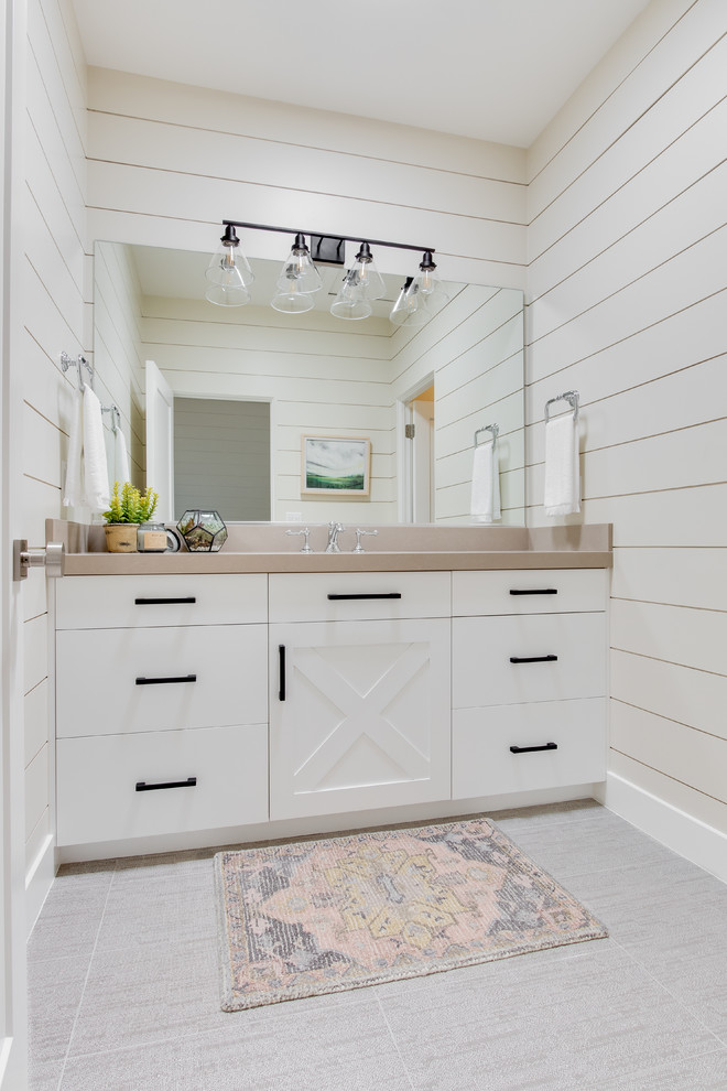 Design ideas for a country 3/4 bathroom in Salt Lake City with shaker cabinets, white cabinets, an alcove tub, a shower/bathtub combo, a one-piece toilet, white walls, ceramic floors, an undermount sink, grey floor, an open shower and white benchtops.