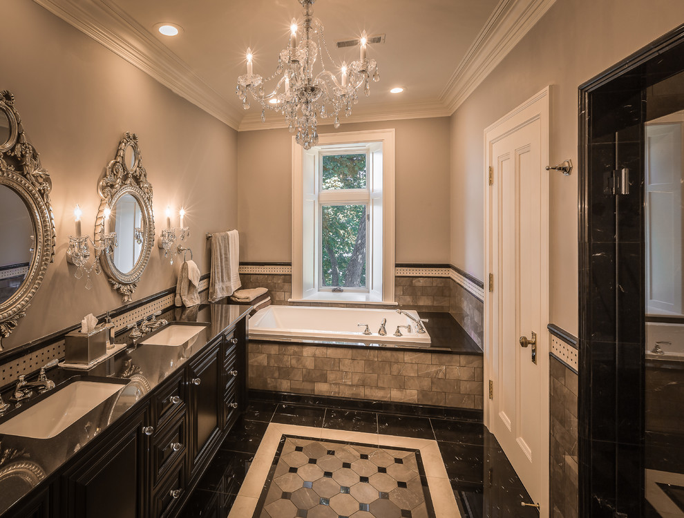 Inspiration for a traditional bathroom in Milwaukee with raised-panel cabinets, black cabinets, a drop-in tub, black and white tile, gray tile, grey walls, an undermount sink, multi-coloured floor, black benchtops and subway tile.