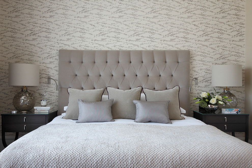 This is an example of a traditional bedroom in London with grey walls.