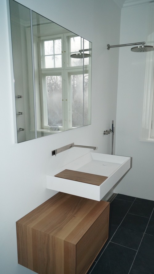 Renovering af badeværelse med før & efter. indrettet med boffi & vola. Badeværelse fra 40erne