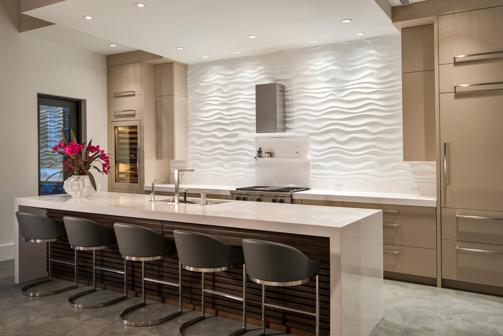 Design ideas for a large contemporary single-wall open plan kitchen in Miami with an undermount sink, flat-panel cabinets, beige cabinets, quartz benchtops, white splashback, stainless steel appliances, porcelain floors and with island.