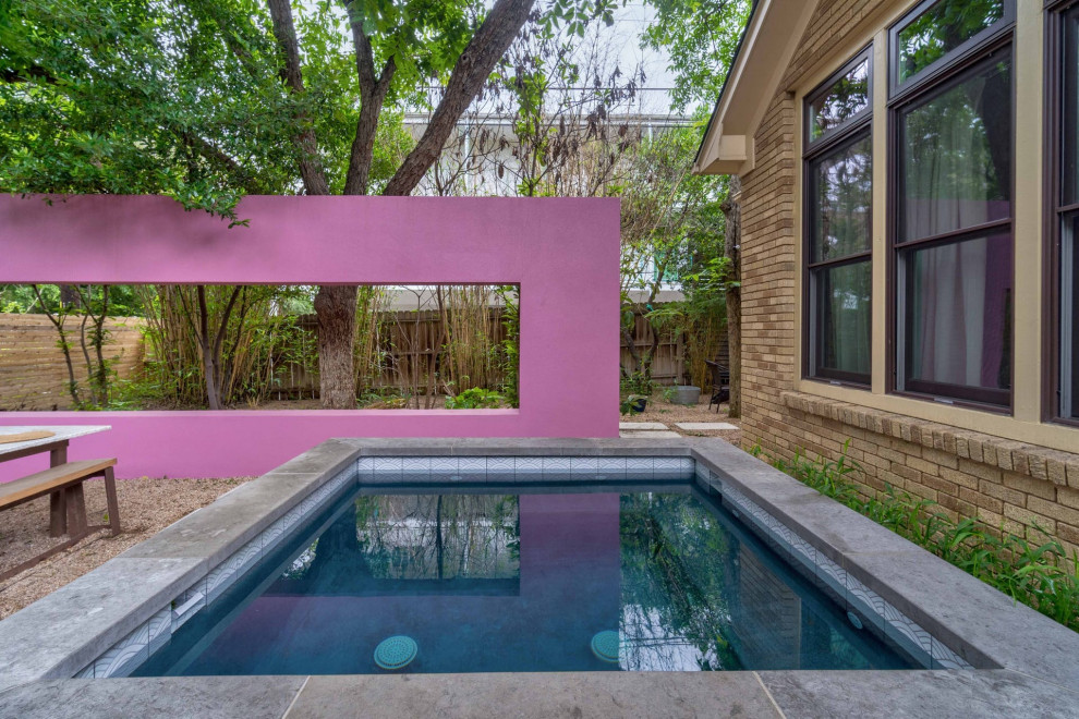 Inspiration for a small modern backyard pool remodel in Austin