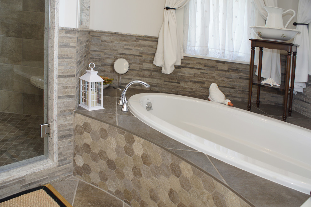 Example of a mid-sized transitional master multicolored tile and porcelain tile porcelain tile drop-in bathtub design with flat-panel cabinets, white cabinets, white walls, granite countertops and an undermount sink