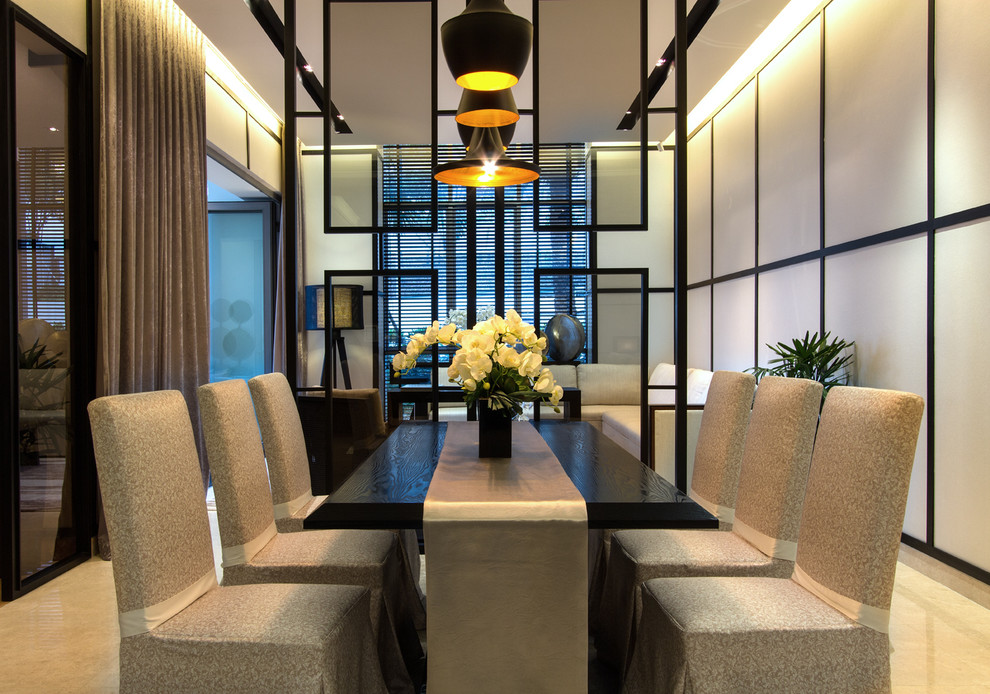 Contemporary separate dining room in Singapore with beige walls and no fireplace.