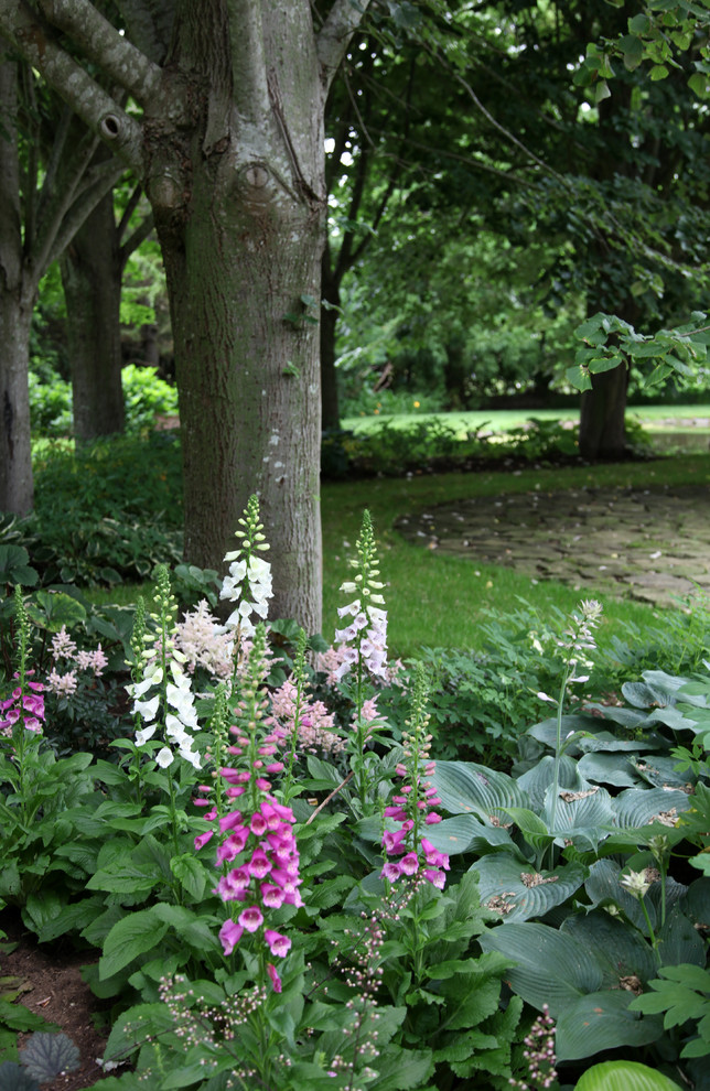 This is an example of a traditional garden in New York with brick pavers.