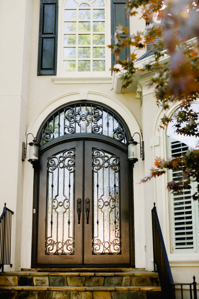 Design ideas for a large country front door in Charlotte with a double front door and a black front door.