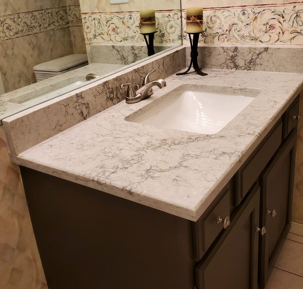 Photo of a mid-sized transitional master bathroom in Chicago with an undermount sink, granite benchtops, a built-in vanity and multi-coloured benchtops.