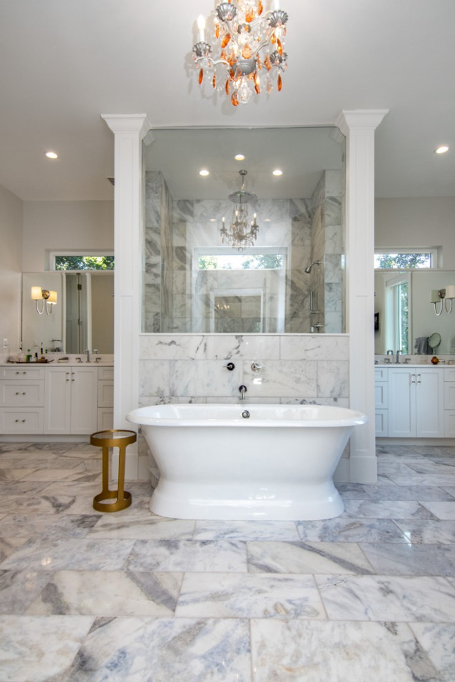Inspiration for a huge transitional master beige tile and ceramic tile ceramic tile, gray floor, double-sink and wallpaper bathroom remodel in Tampa with glass-front cabinets, a one-piece toilet, gray walls, an undermount sink, quartzite countertops, a hinged shower door, white countertops and a built-in vanity