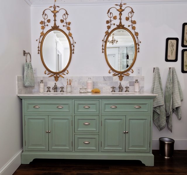 Design ideas for a traditional master bathroom in Indianapolis with turquoise cabinets, marble and white walls.